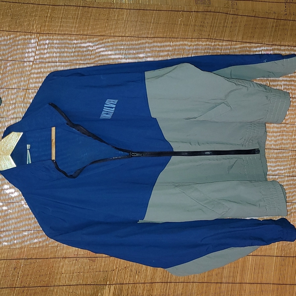 Vintage.  Made in USA. Quicksilver windbreaker. Size Medium but fits large.